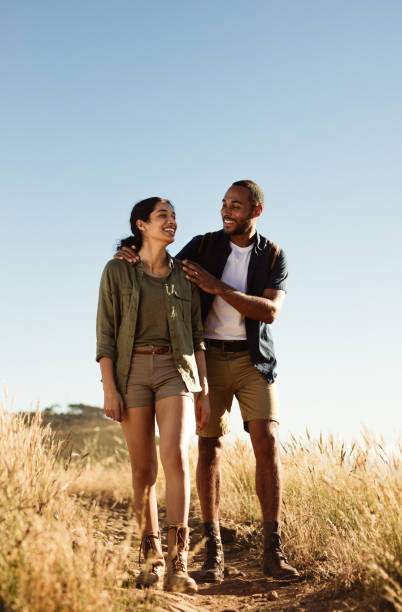 istock Couple hiking on rough terrain 1280284566