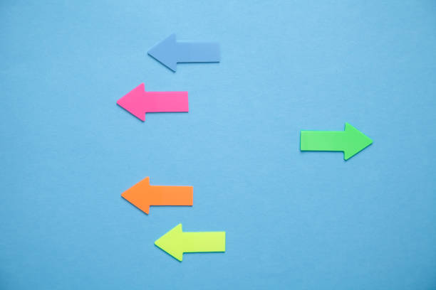 istock Colorful arrows on blue background. 1280284677