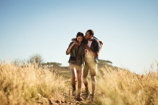 istock Couple enjoying a hiking trip 1280284887