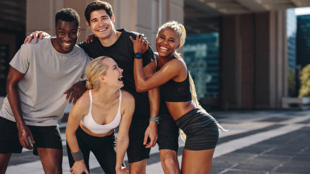 istock Fitness group enjoying themselves outdoors 1280285899