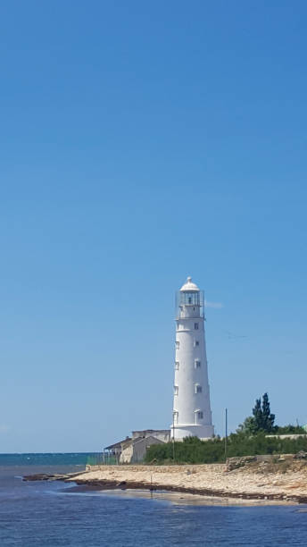 istock Lighthouse near the shore 1280293051