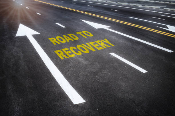 road to recovery word on road with white arrow - condition optimal text healthy lifestyle imagens e fotografias de stock