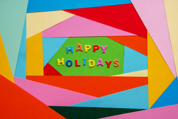 istock Colorful Letters Building Text Happy Holidays. Colored Paper As Background 1280296018