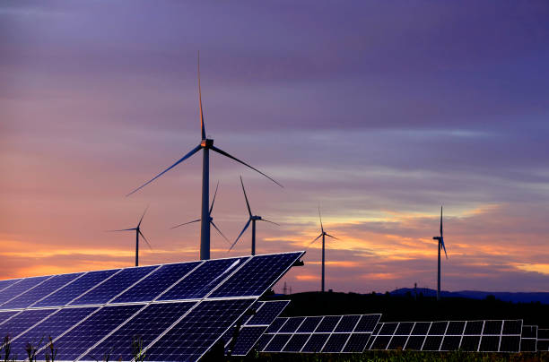 istock Solar photovoltaic panels and wind turbines 1280296364