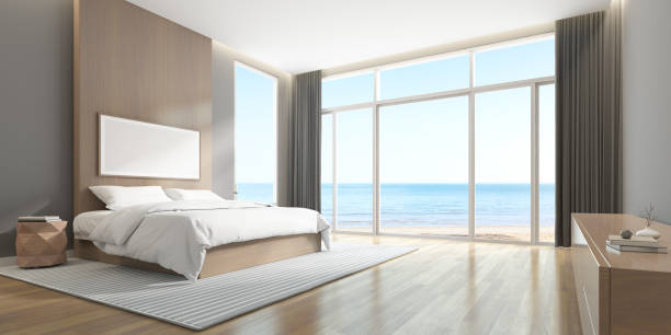 istock 3D rendering of modern bedroom with sea view background. 1280296961