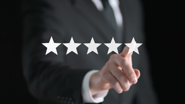5 star rating or review in survey, poll, questionnaire or customer satisfaction research. Happy business man giving positive feedback with abstract five stars.