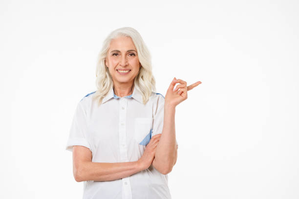 istock Mature old cheerful woman pointing. 1280300498