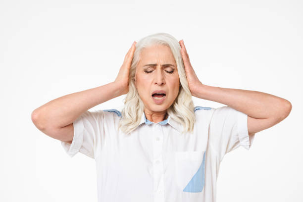 istock Mature old woman standing isolated 1280302129