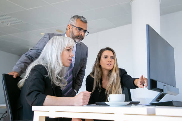 istock Business group watching presentation on pc monitor 1280302151