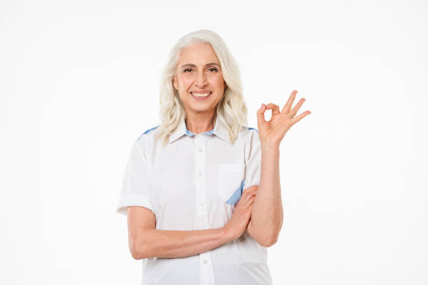 istock Mature old smiling woman showing okay gesture. 1280303119