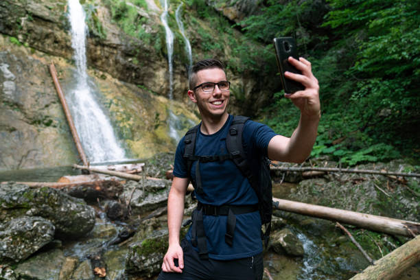 istock Young Caucasian man taking a selfie in the nature 1280304447