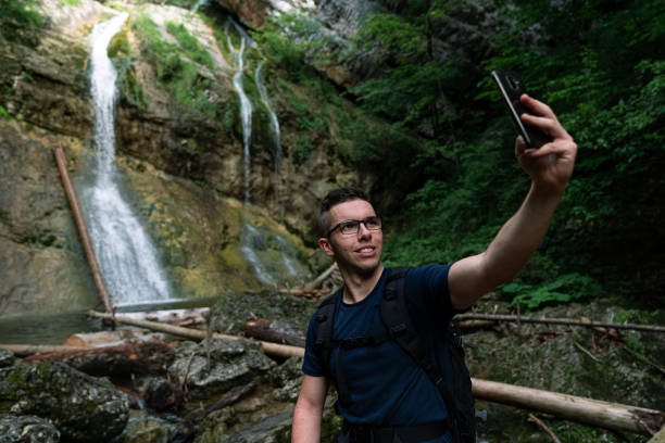 istock Young Caucasian man taking a selfie in the nature 1280304597