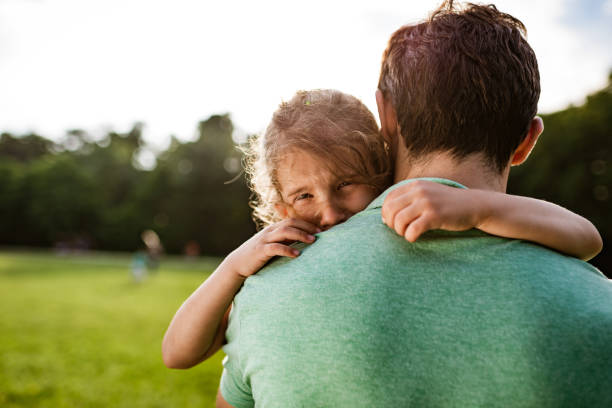 istock Father consoling his daughter 1280311131