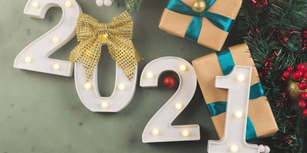 istock New year festive green background with 2021 number 1280312451