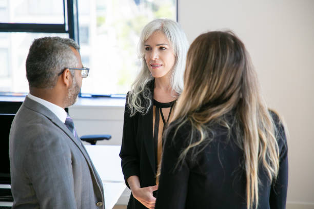 istock Company managers wearing suits 1280312572