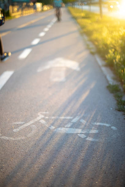 Bicycle path symbol drawn on asphalt stock photo