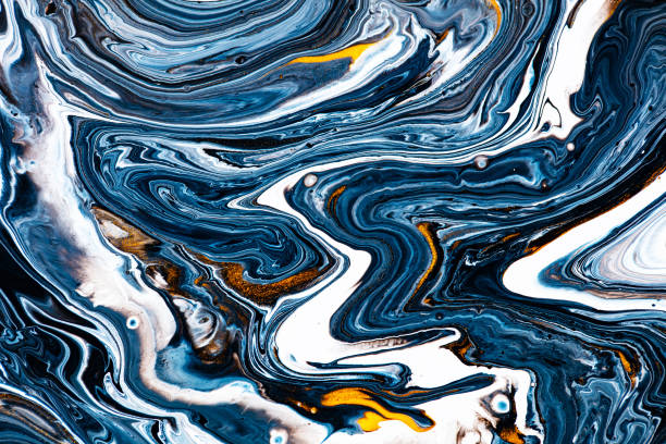 istock Fluid art texture. Background with abstract swirling paint effect. Liquid acrylic picture that flows and splashes. Mixed paints for website background. Black, navy blue and golden overflowing colors. 1280318038