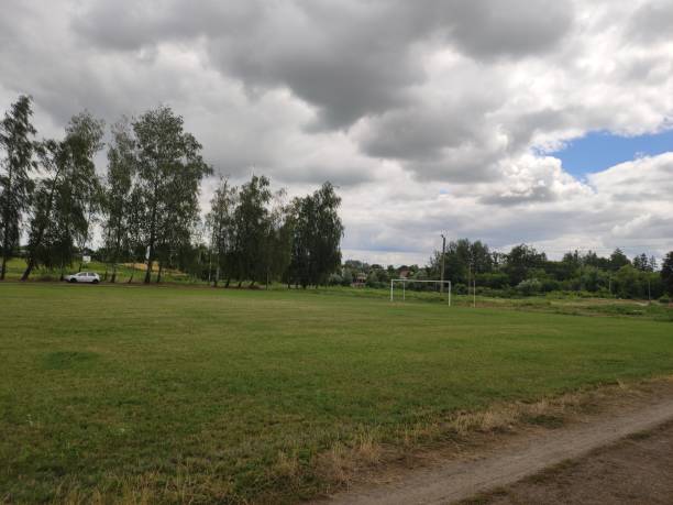 istock large soccer field with green grass in summer 1280319297