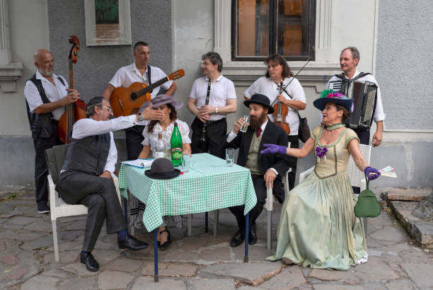 Belgrade, Serbia Jul 5, 2019: Actors recreating city life scenes from early 20th century at the touristic Skadarska Street also known as Skadarlija.