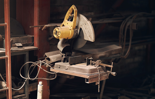 Shot of a power tool in a foundry