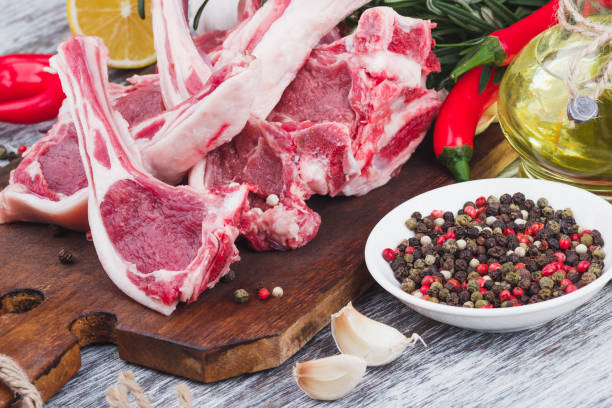 istock Raw lamb chop on the wooden board 1280324098
