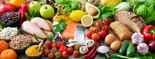 istock Composition with assorted organic food products on wooden table 1280325828