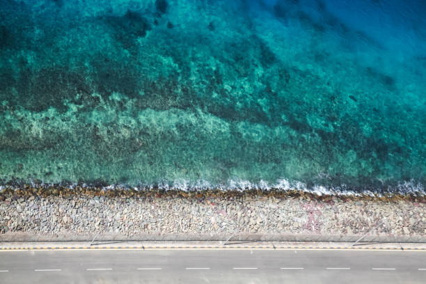 istock Breakwater made of concrete blocks, top view 1280328153