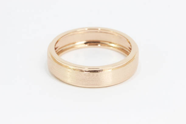 Rose Gold Band Ring with Matt Texture Finishing on Top Surface stock photo