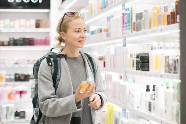 istock Smiling Woman Standing In Front Of Store 1280329774