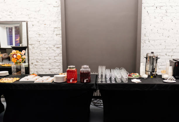istock Tasty food and drink on black table for event 1280332071