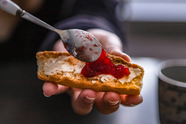 Tartine and jam Morning toast with its butter and jam. crostini stock pictures, royalty-free photos & images