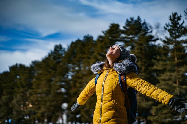 istock Woman absorb sunlight in winter 1280334523