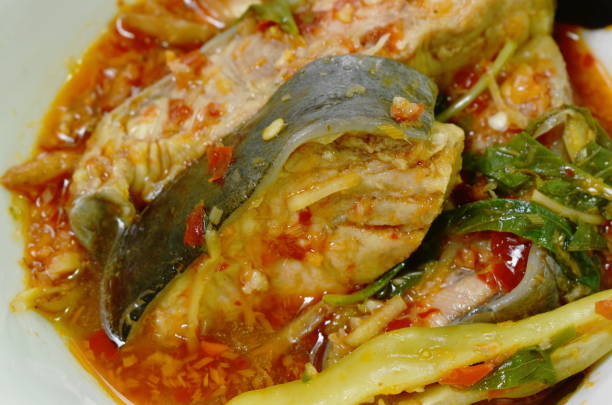 istock spicy fried catfish with finger root and chili in curry 1280335925