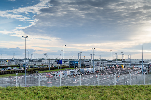 Coquelles,  France - October 12, 2020 : Eurotunnel station in Coquelles, France . Cars and other vehicles are transported by the Eurotunnel train.