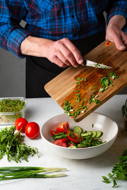 istock Cooking healthy salad on home kitchen 1280340952