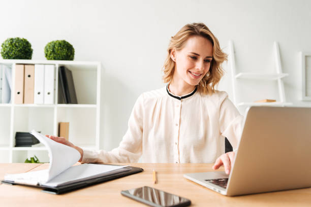 istock Smiling young business woman 1280342794