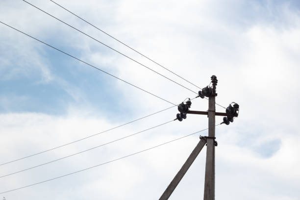 istock Geometry in the sky. Electric pole with wires. 1280343800