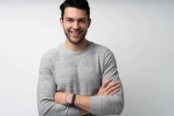 istock Handsome young man on white background looking at camera. Happy guy smiling 1280348439