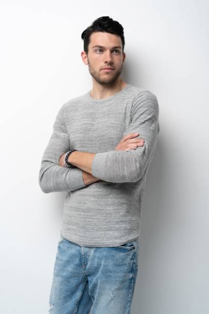 istock Handsome young man on white background looking at camera. Happy guy smiling 1280348469
