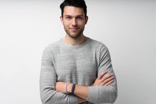 istock Handsome young man on white background looking at camera. Happy guy smiling 1280348479