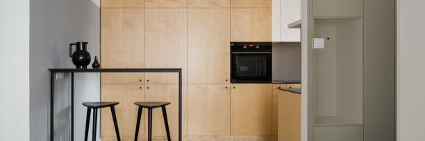 istock Kitchen with plywood cupboards, panorama 1280350181