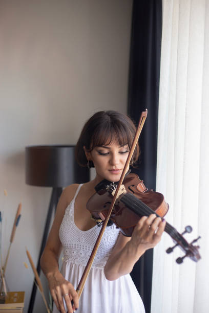 istock Woman plays violin. 1280354791