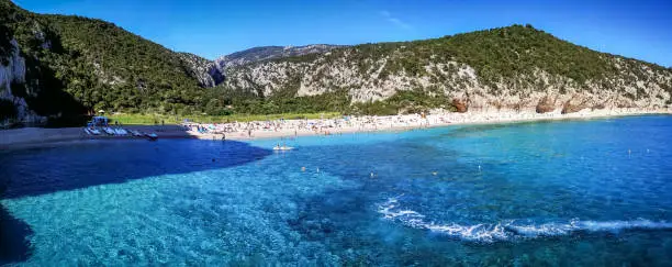 Ultra wide panorama of the beach and the coast line of Cala Luna
