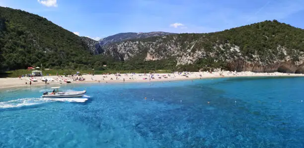 Photo of Ultra wide panorama of the beach and the coast line of Cala Luna