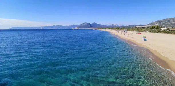 Photo of ultra wide panorama of a  beach of Orosei