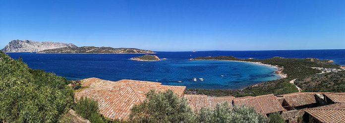 Aereal ultra wide panorama of Capo Coda Cavallo in Sardinia with Tavolara island in background