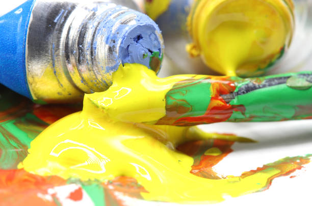 istock close-up colorful paint splashes background 1280356766