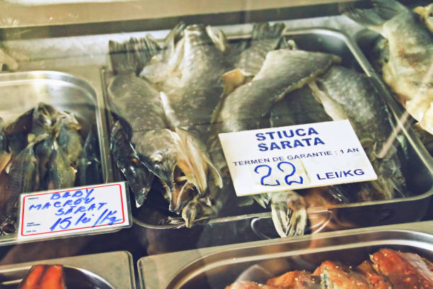 istock Freshwater fish from the Danube river in conservation displayed for sale. 1280358336
