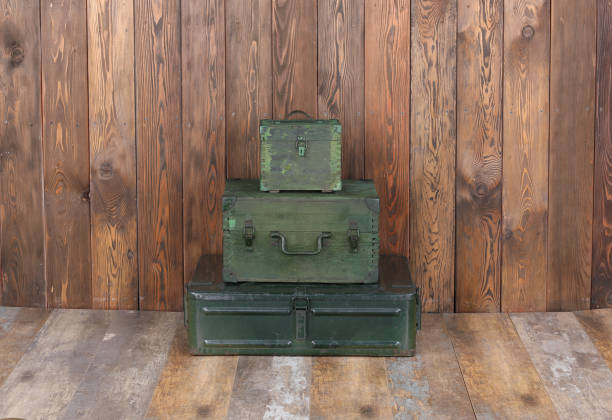 istock green military boxes on a wooden background 1280358432