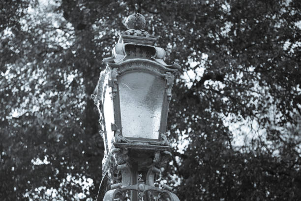 istock lantern in munich, historic latern in black and white 1280360656